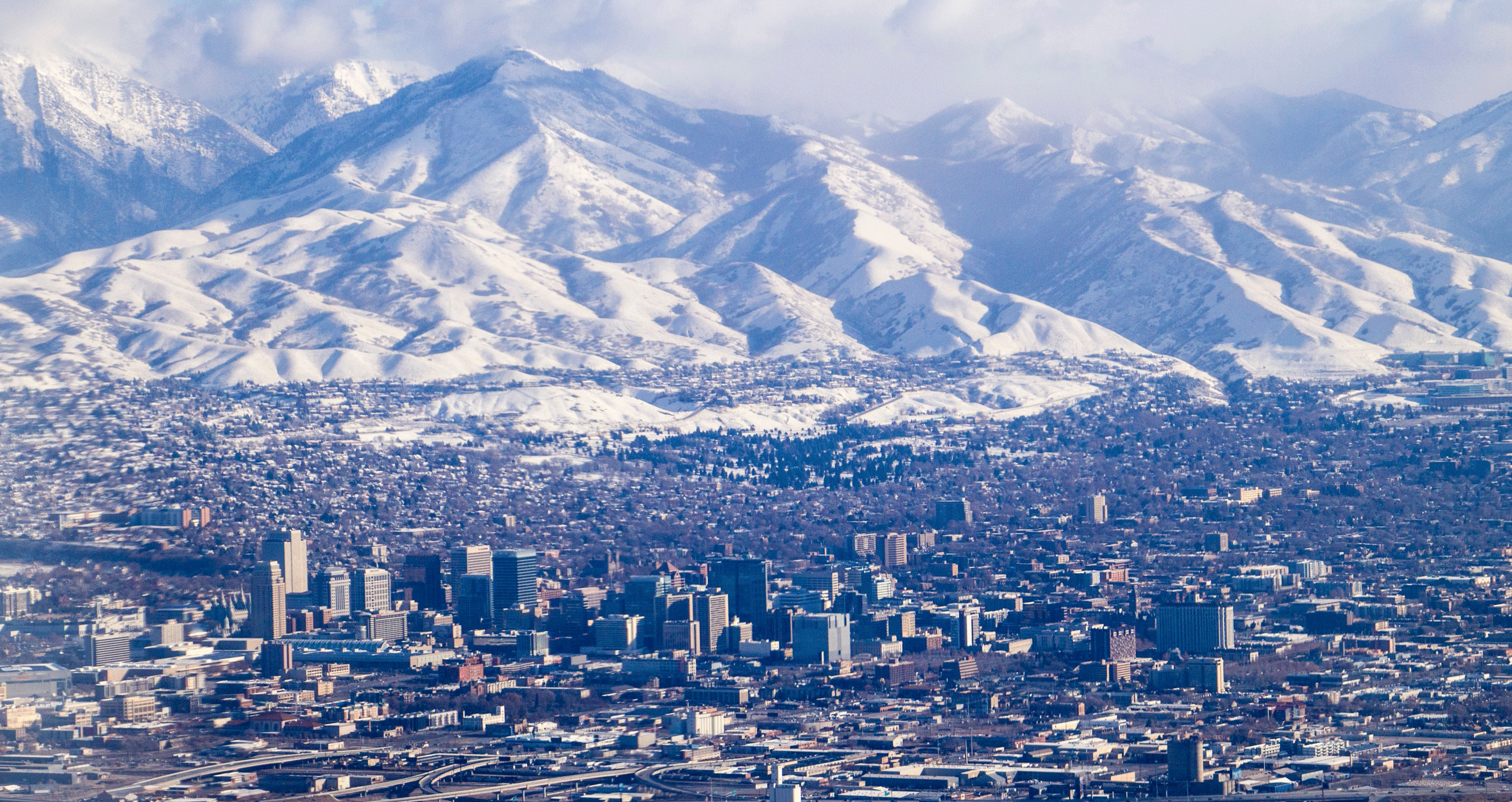 Snowy mountain near city